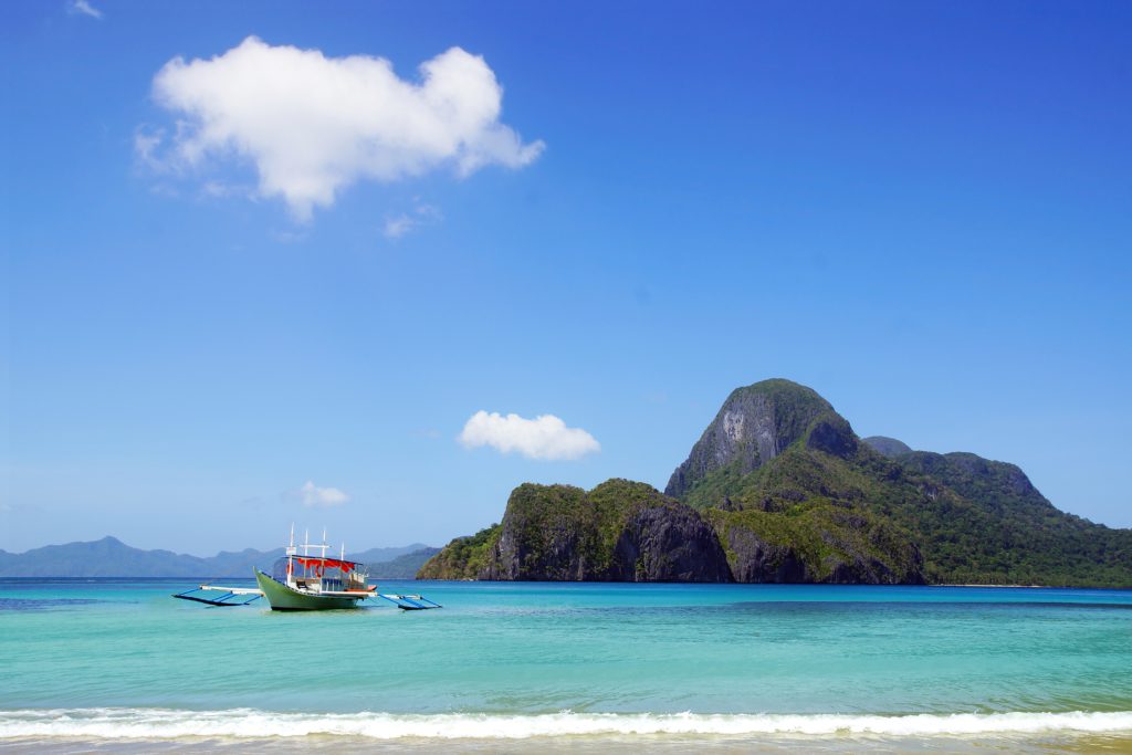 Island-hopping in El Nido featured in a Palawan Travel Guide.
