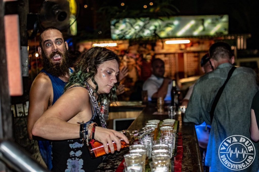 Bartenders serving drinks at Viva Bar, Vang Vieng