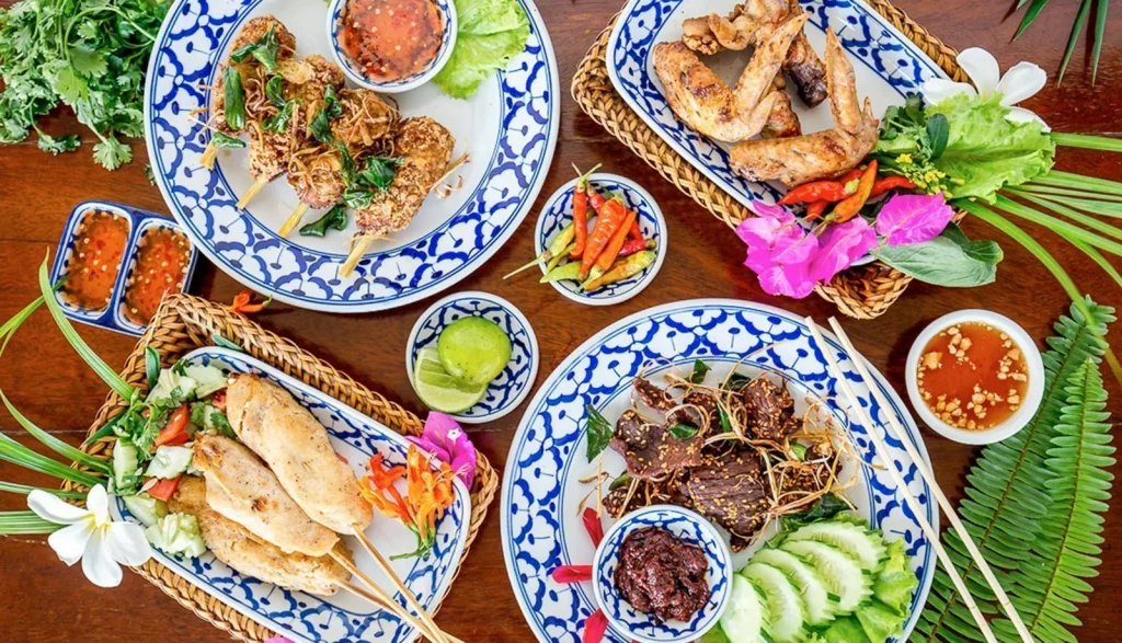 A spread of Laotian dishes at Restaurant du Crabe d'Or, Vang Vieng