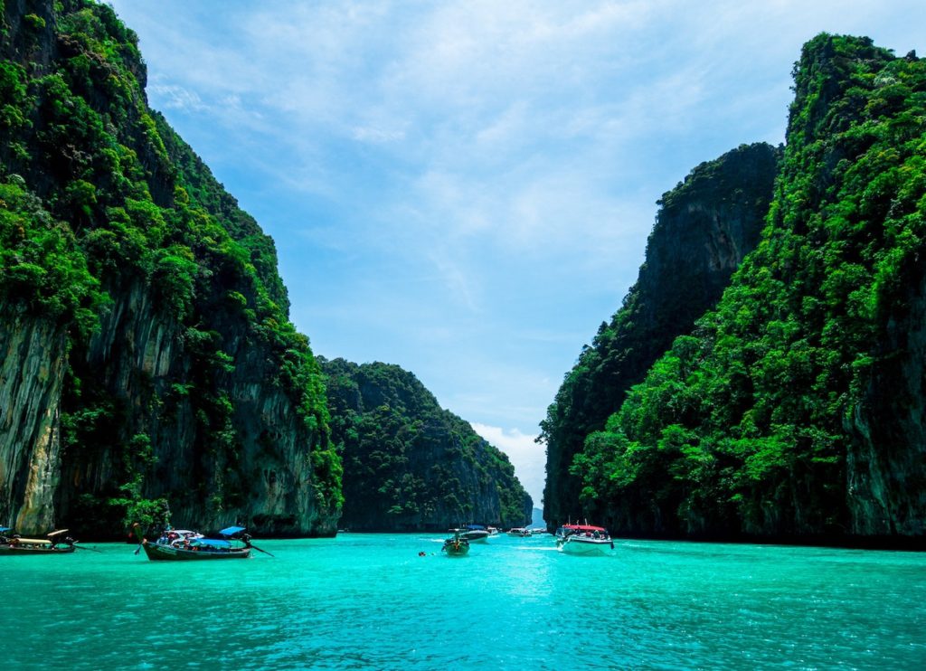 Limestone cliffs and boats in the Phi Phi Islands, Thailand