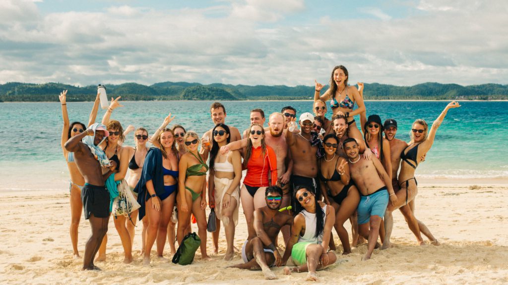 Group of travelers enjoying the Koh Rong boat party in Cambodia.