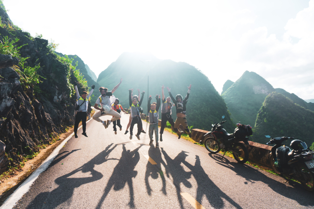 Is the Ha Giang Loop safe: group of travelers exploring the mountain roads.
