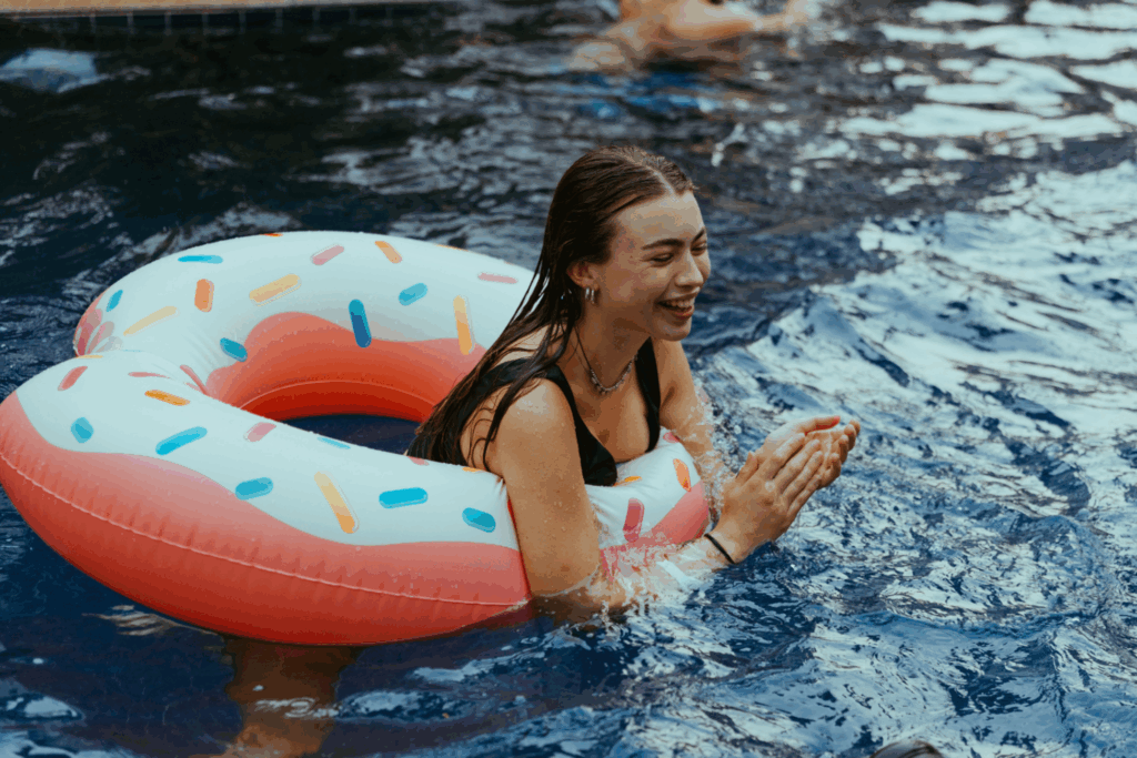 Guest floating in the pool at Mad Monkey Nusa Lembongan Pool Party.